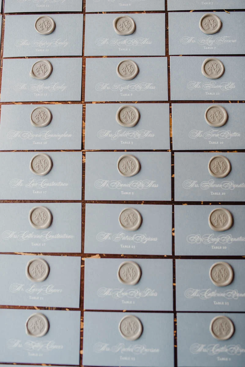 Wax seal escort cards with calligraphy
